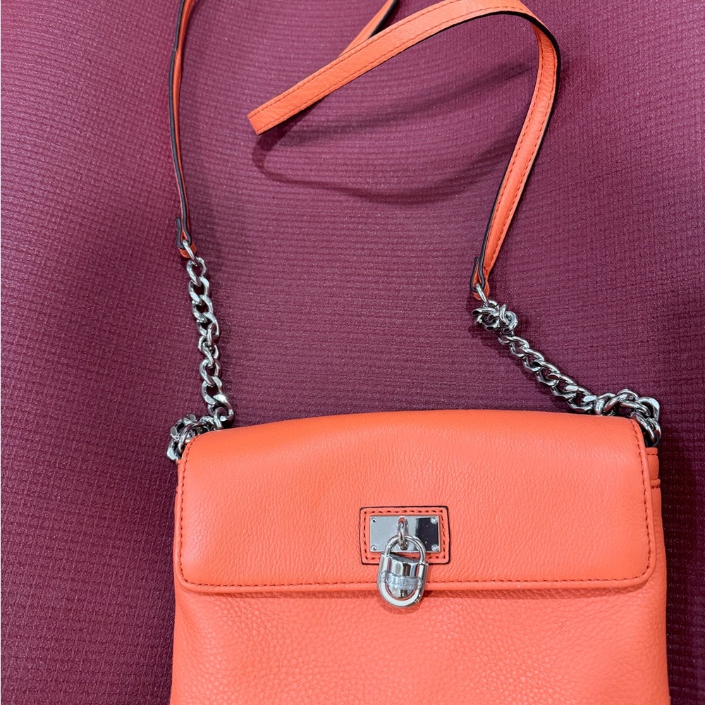 Leather terracotta Calvin Klein purse with metallic detail/chain strap